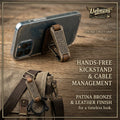Uebnzns Vintage Utility Grip used as a phone kickstand and cable organizer