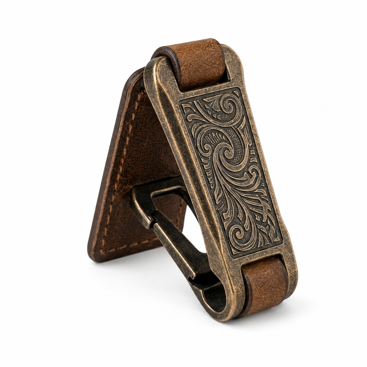 Close-up of engraved bronze-tone Uebnzns utility grip with brown leather-style support