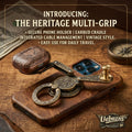 Uebnzns Heritage Multi-Grip on a leather phone case with engraved antique-brass ring and earbud cradle
